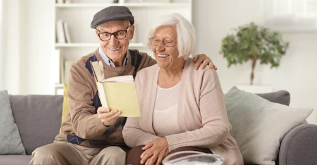 Senior couple reading a book together