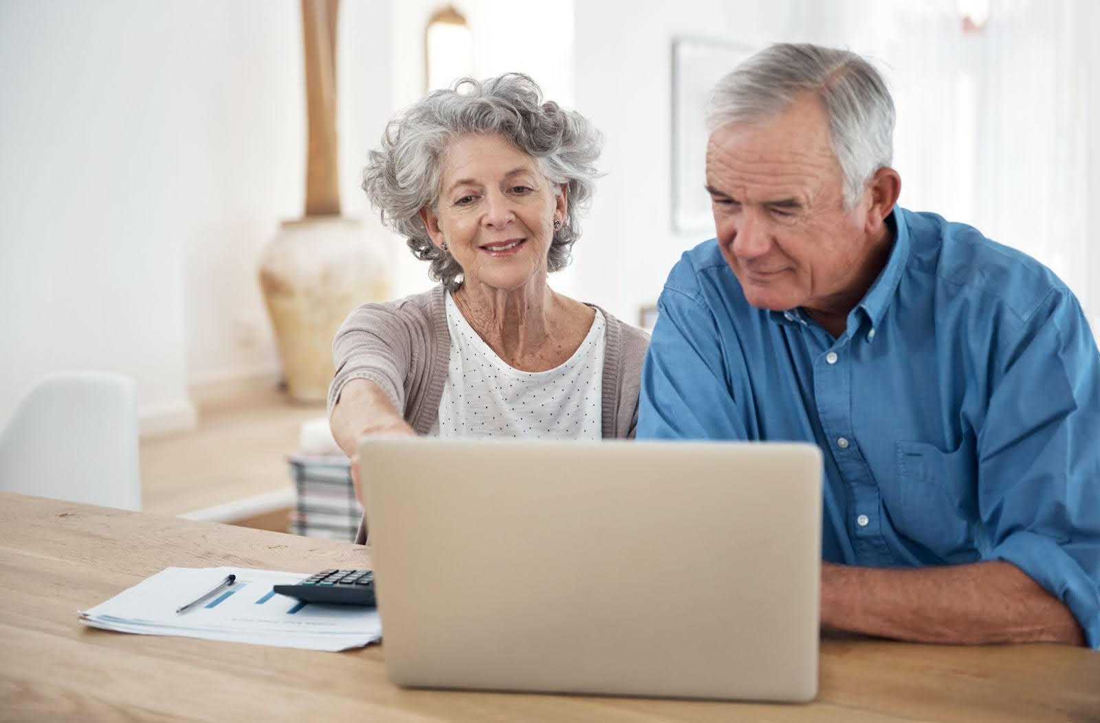 Senior couple looking at insurance