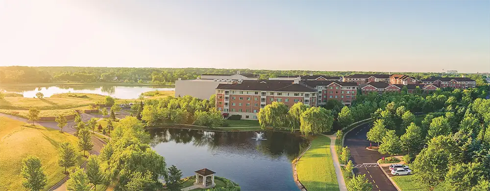 Header-Image-1-mobile Aerial view of campus