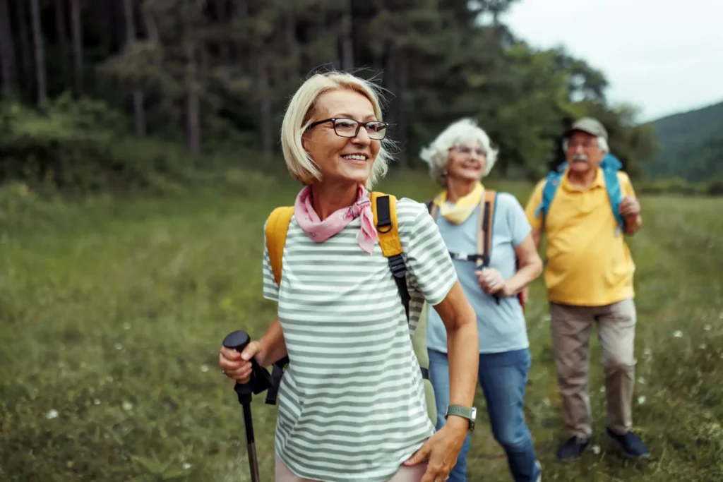 A group of of seniors on a walk near Sedgebrook, one of the best exercises to increase balance for seniors.